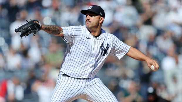 Yankees starting pitcher Nestor Cortes throws to the plate during an ALDS game against the Guardians.